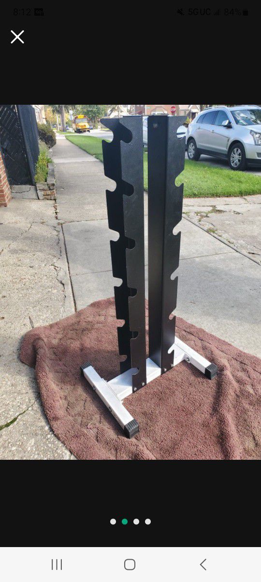NORTHERN LIGHTS  VERTICAL DUMBBELL RACK  HOLDS 6 SETS 
7111.S WESTERN WALGREENS 
$75.   CASH ONLY AS IS 
