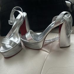 Christian Loubiton Silver Heels  Size 39 $250