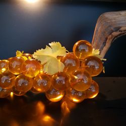 VINTAGE LUCITE ACRYLIC GRAPE CLUSTER 17" W By 9"H ON DRIFTWOOD AMBER TO ORANGE HUE