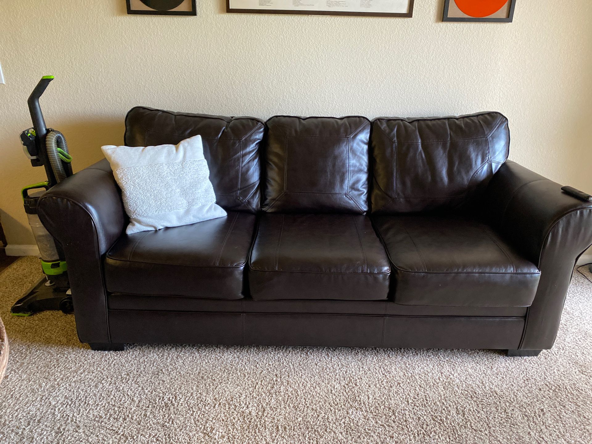 Couch- dark brown faux leather