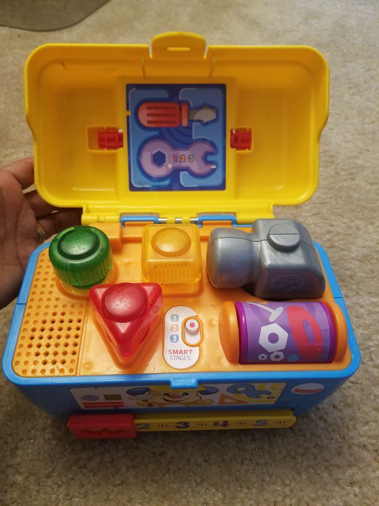 Fisher Price lights and sounds tool box.