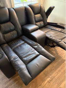 Two sofa recliners available.