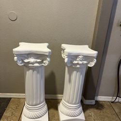  2- 28” tall  Pedestal Stand Figurine Sculpture, for Wedding Home Garden Indoor Outdoor Decoration(White). The dimensions are 8.5”Dx8.5”Wx28”H It’s av