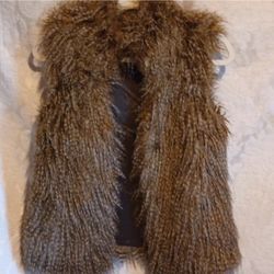 faux fur vest.