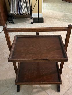 Drop leaf tray table.