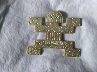 Brass Colombia Pendant with gems. $100
