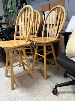 Three swivel chairs
