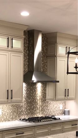 Stainless Steel Hood and 5 Burner Gas Cooktop