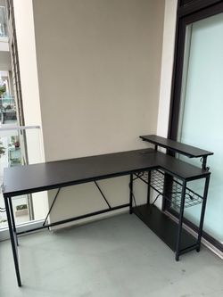Bronach 58.07” LED Gaming Desk With Power Outlet, L-shped Computer Desk With Monitor Stand