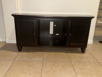 $100 TV Console in the Vintage Ebony finish.
