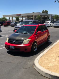 Scion xA Carbon Fiber Hopd