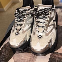Louis Vuitton Runner Tatic Sneakers in the White, Silver, and Black colorway