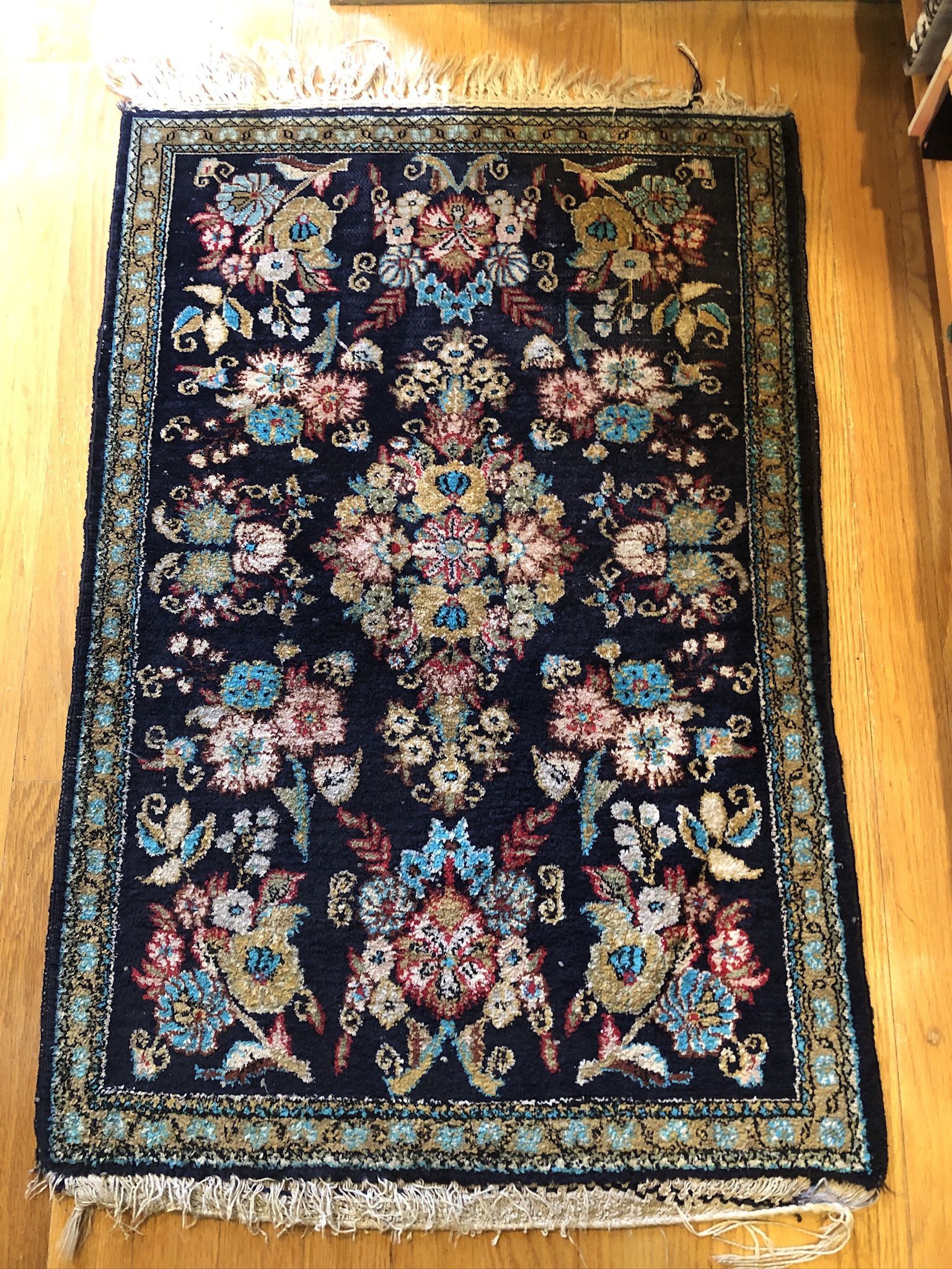 Magnificent 100% handmade silk rug from Iran. It is handwoven in the town of Ghom (Iran) where most silk rugs are made. Size is 23” x 35”. It comes fr
