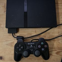 PS2 Slim With 32 Games $190 OBO