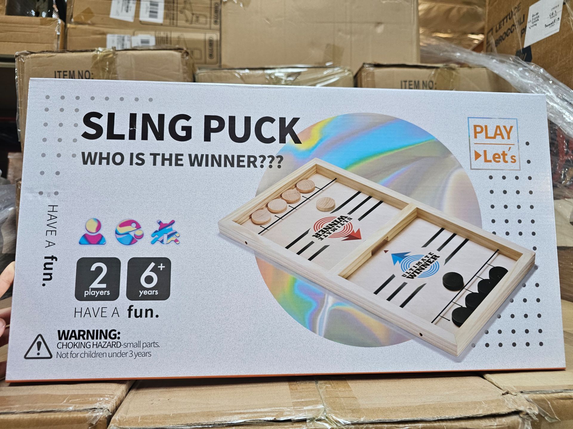 Play Let's Sling Puck Board Game