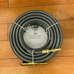50ft Garden Hose New With Nozzle $25.00
