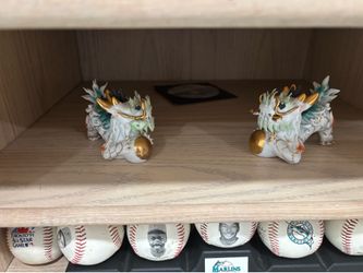 vintage porcelain and brass dragon figurines