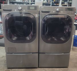 LG Super Capacity washer and dryer on pedestals
