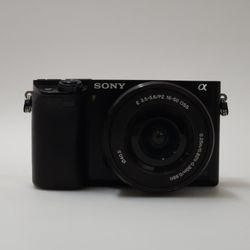 Sony Alpha A6000 24.3MP Compact Mirrorless Digital Camera w/ ECM-Xyst1m Stereo Mic