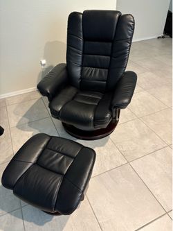 Recliner swivel chair with foot stool