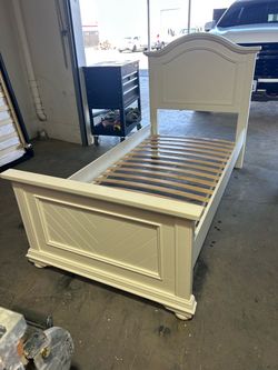 Twin white bed