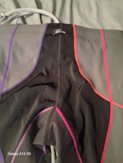 CW-X medium compression black with pink and purple trim leggings like new condition