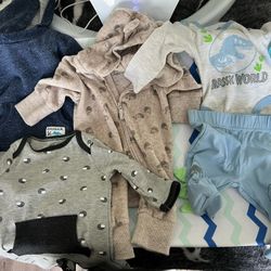Baby Clothes And Changing Pad