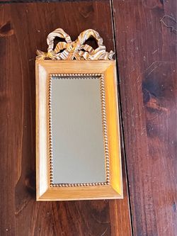 Gold Ornate Wall Mirror with Bow Detail