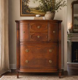 Unique Early 20th Century Vintage Bow Front Highboy Dresser with Ornate Brass Hardware