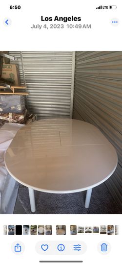 Light gray round dining room table