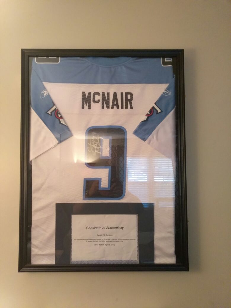 Late great Steve MCnair signed authentic jersey in shadow box with  certificate of authenticity for Sale in Stockbridge, GA - OfferUp