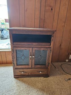 Media and stroage cabinet with leaded glass