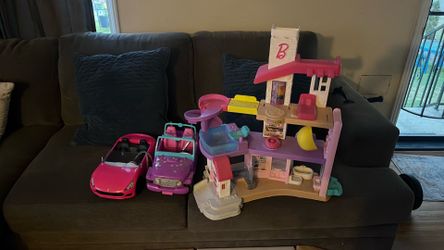 Barbie doll house and 2 Barbie cars
