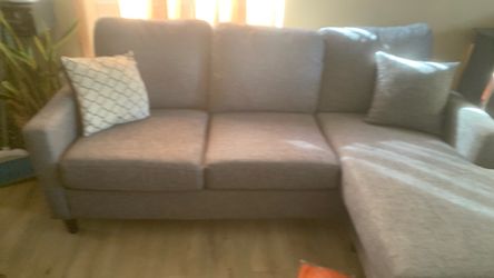 New grey couch for sale