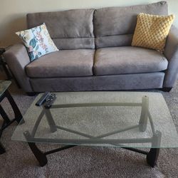 Couch, Glass Coffee Table With Matching End Tables And Decorative Mirror 