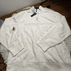 White  Tommy Hilfiger quarter-zip sweatshirt with an embroidered logo Still with tag  There’s flaws as seen in the last two pictures (stains)  XL on t