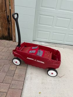 Radio Flyer wagon with seats and seat covers