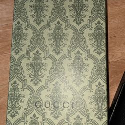 Black GG Gucci slides