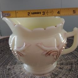 antique creamer made by Heisey in the 1880s