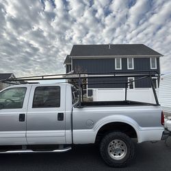 Pick up truck ladder rack must pick up free