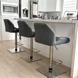 Set of 3 Modern Adjustable Bar Stools – Gray Faux Leather & Stainless Steel Base