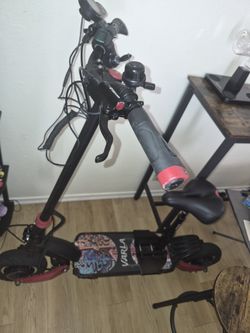 Varla eagle, one forty mile per hour, dual motor scooter