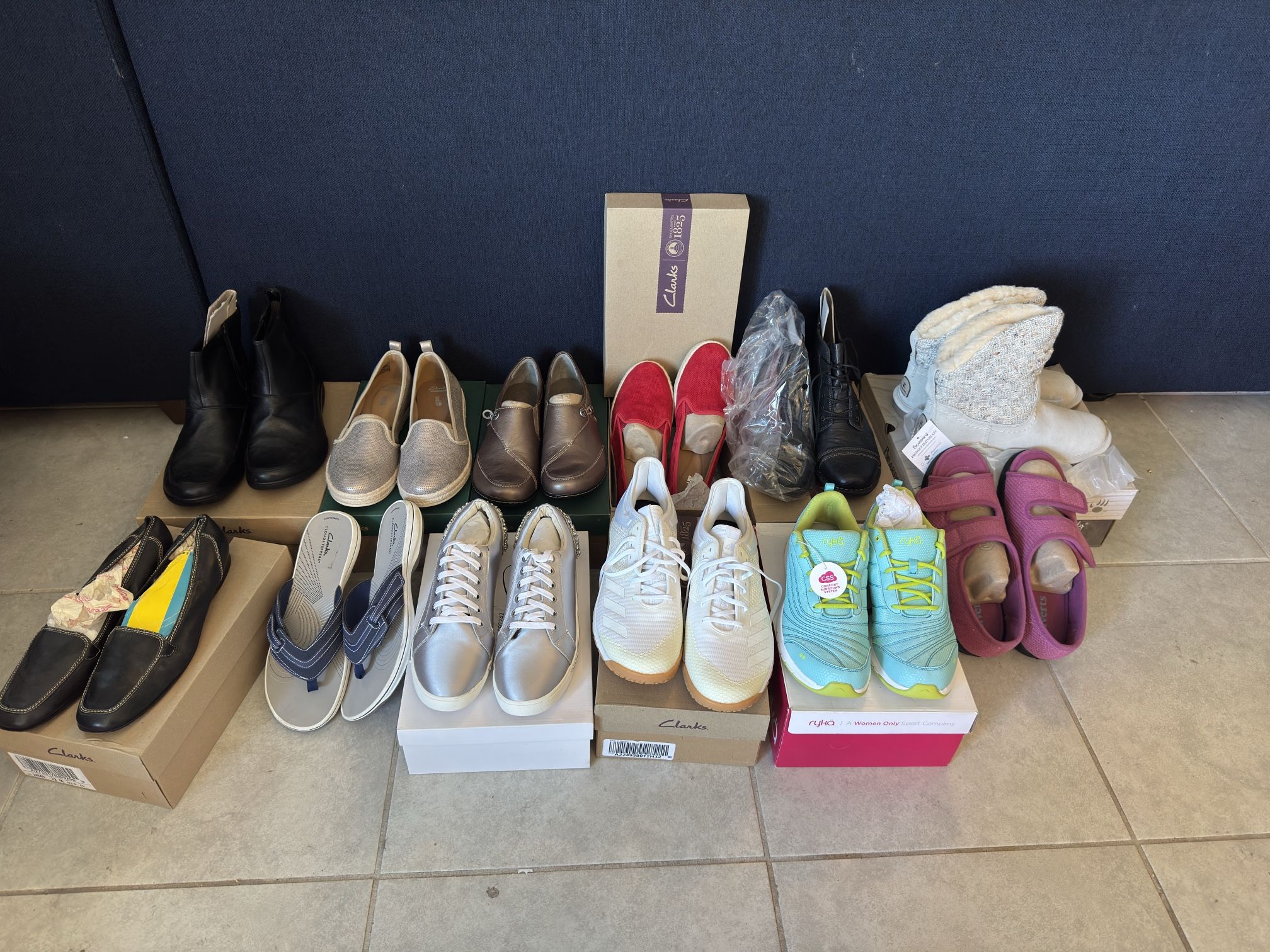 One Lot Of 12 Pairs of New Women’s Shoes – US Size 12 W – Clarks, Adidas & More