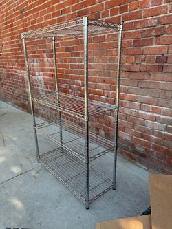 4-Tier Steel Wire Shelving Unit in Chrome (36 in. W x 54 in. H x 14 in. D). I have 2 available.