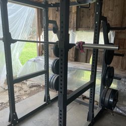 Full Squat Rack And Weight Rack + 2x Bars
