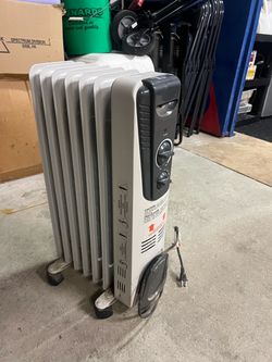 Coiled plug in heater