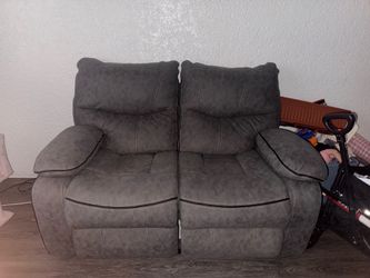 Grey couch/Lay back Couch