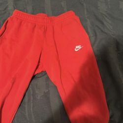 red nike joggers