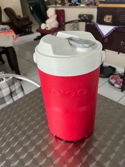 Very good plastic cooler for keeping ice; measures 12 inches high by 6 inches wide