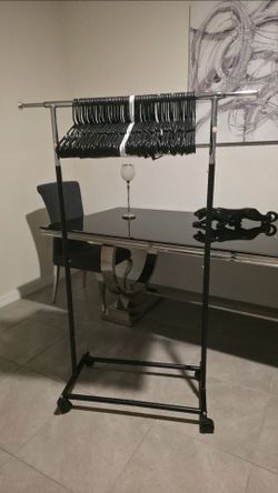 Clothes Rack - 58" Tall with 50 free plastic hangers - $30